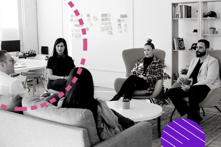 Four people sitting in a modern office, engaged in a discussion. A whiteboard with sticky notes is in the background. Pink and purple graphic elements are overlaid on the image.