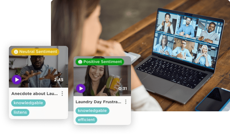 A person observes a video call on a laptop with six participants while two sentiment analysis cards are displayed in the foreground, summarizing video content.
