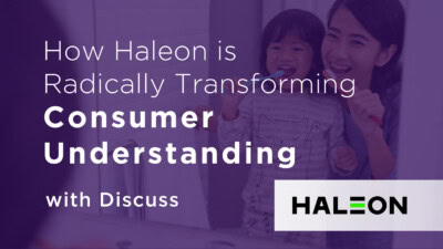 A woman and child smile in the bathroom, brushing teeth, embodying how Haleon is radically transforming consumer understanding. Text reads: "How Haleon is Radically Transforming Consumer Understanding with Discuss." Haleon logo present.